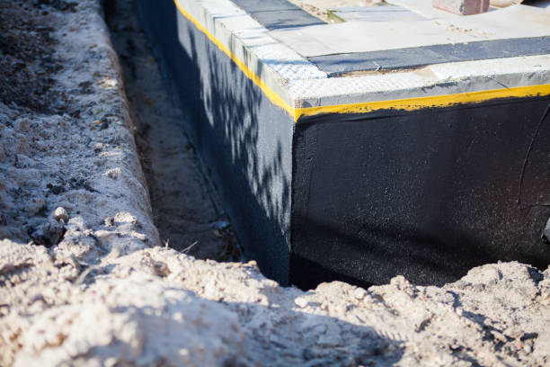 Professional Waterproofing technician working in Haworth, NJ